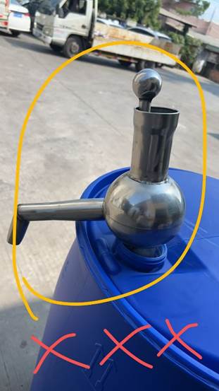 A metal spout on a blue barrel
AI-generated content may be incorrect.